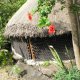 34- Maison construite en bouteilles de biere 
